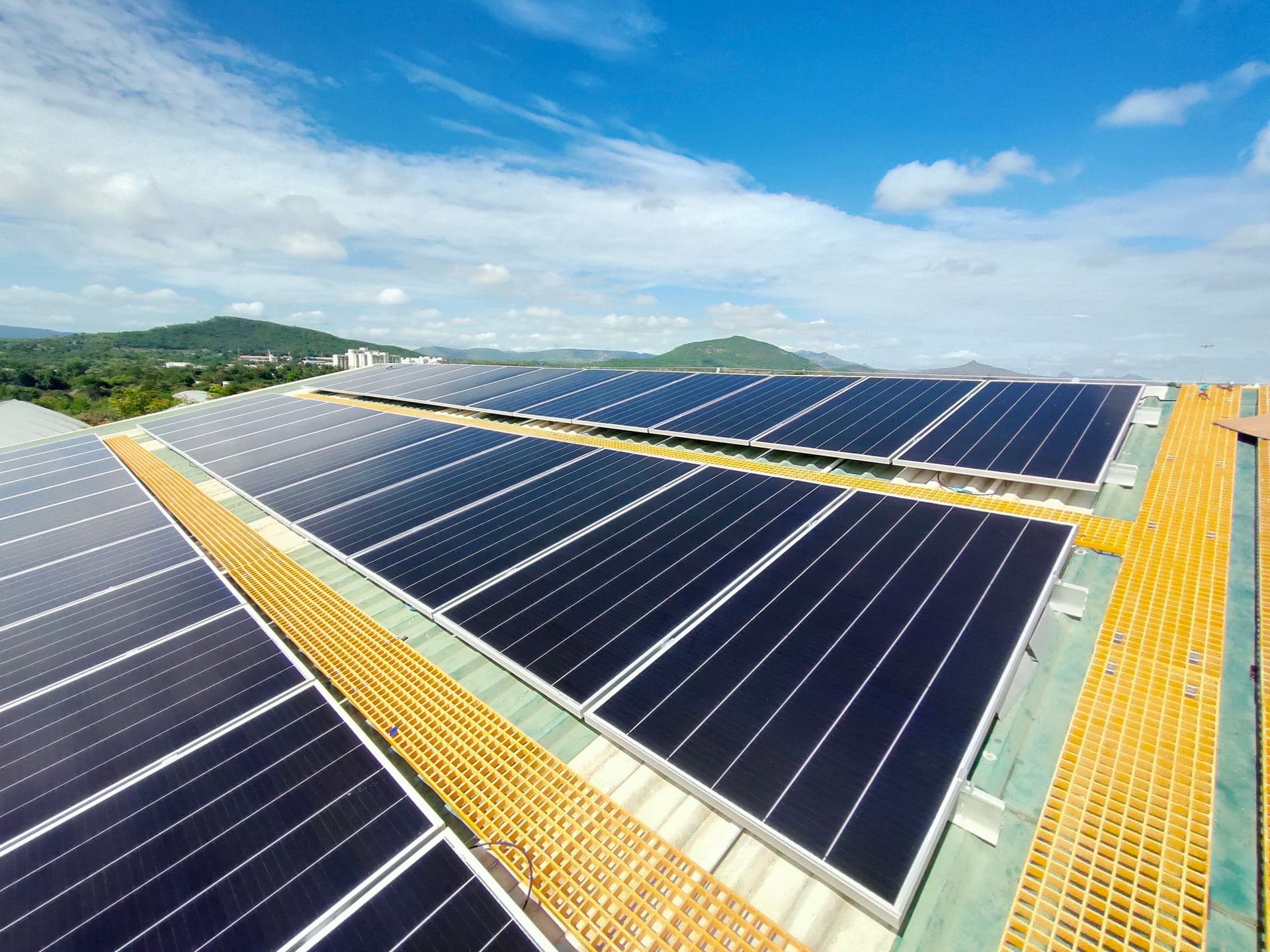 Large commercial rooftop covered with solar panels